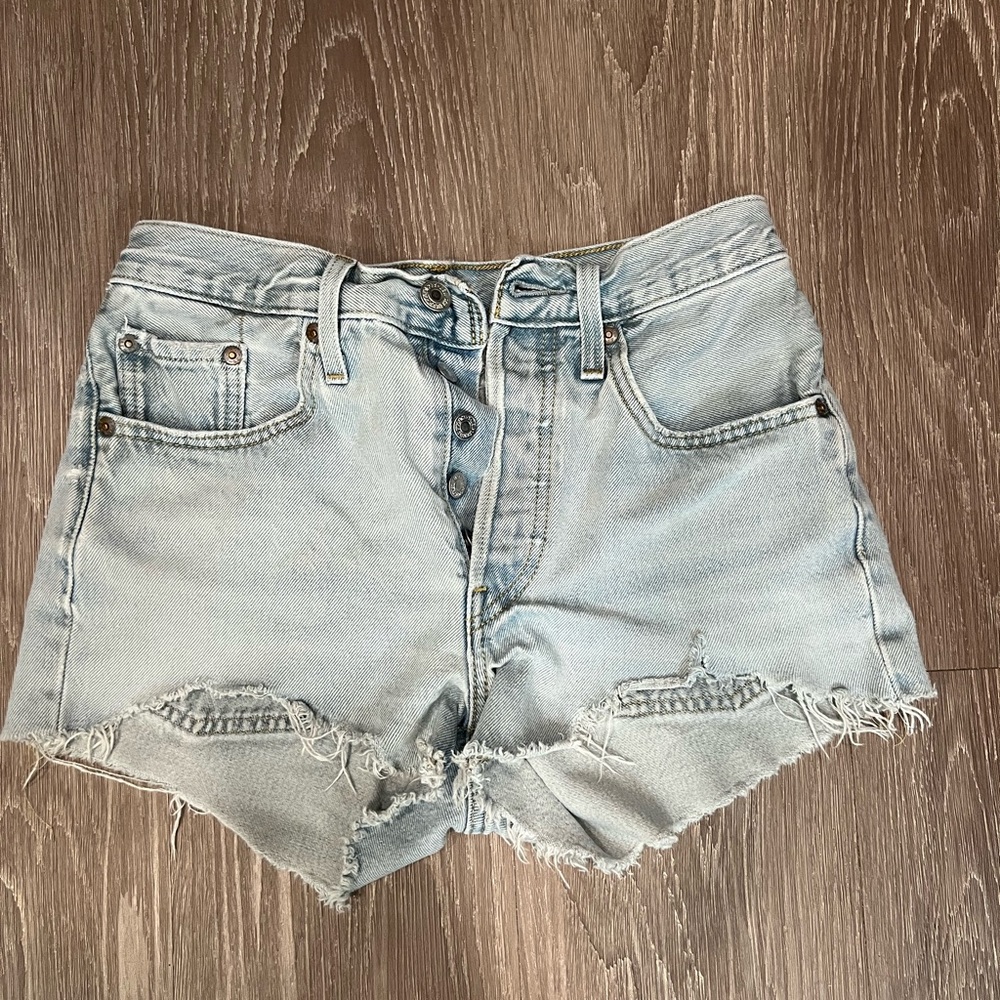 Blue High-Waisted Levi 501 Jean Shorts with Distressed Hem
